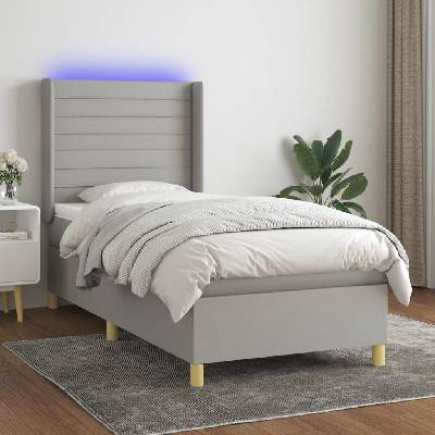 Petrashop 3138925 boxspring postel s matrací a LED světle šedá textil