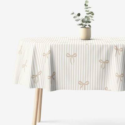 Goldea oválný ubrus 100% bavlněné plátno latte mašličky s proužky 120x200 cm