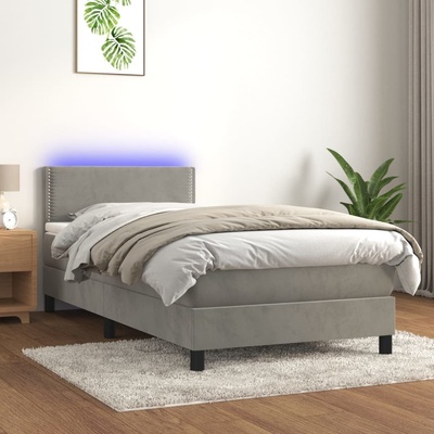Petrashop 3134309 boxspring postel s matrací a LED světle šedá samet