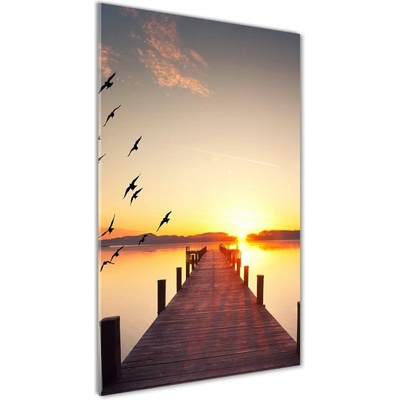 Vertikálny fotoobraz na skle Západ slnka mólo 50x100 cm