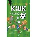 Kluk v kopačkách
