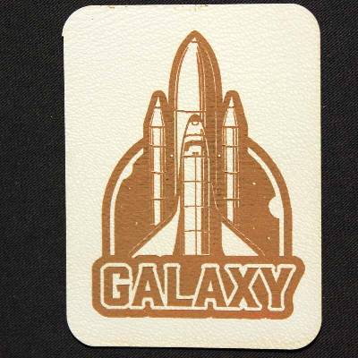 Štítok - Galaxy raketa Materiál/farba: Tehlová koženka
