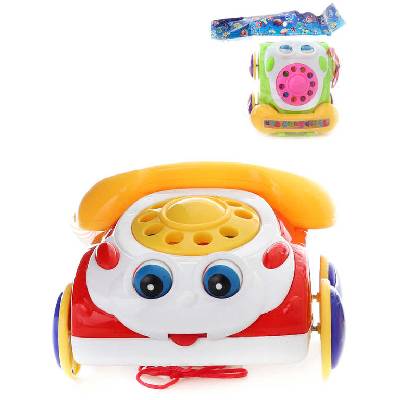 Baby telefon veselý tahací pískací 19cm pohybuje očima 2 barvy plast