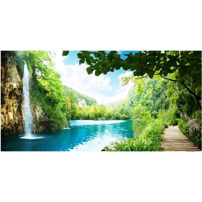 Foto obraz sklenený horizontálny Vodopád v lese 100x50 cm