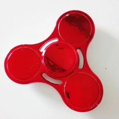 Fidget spinner kovový červený