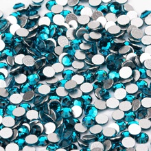 Broušené kamínky na nehty typ Swarovski Blue Zircon SS6 modré 100 ks