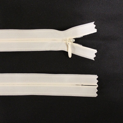 Spirálový zip no.3 skrytý nerozepínací 35cm - více barev color: 504 ivory