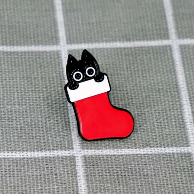 Pinarna Černá kočka ve vánoční ponožce