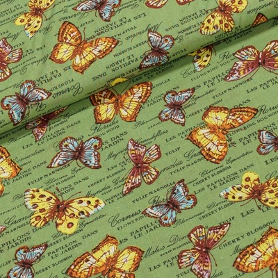 Bavlněné plátno motýli a nápisy na zelené, š.140cm (látka v metráži)