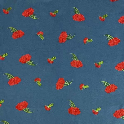 Kabátovina modrá, vyšívané červené kvety, š.150