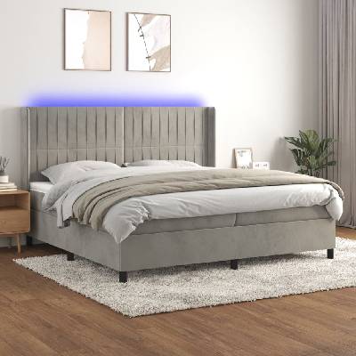 Petrashop 3139703 boxspring postel s matrací a LED světle šedá samet