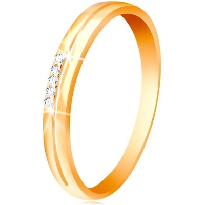 Šperky Eshop Prsten ve žlutém zlatě ramena s úzkým výřezem čirá zirkonová linie S3GG58.23