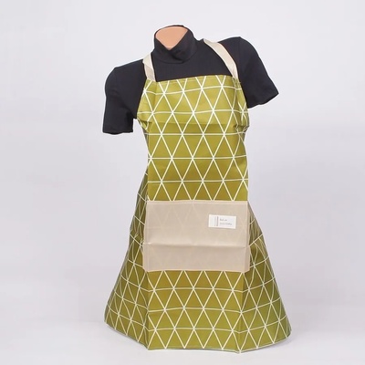 Готварска престилка в зелено на триъгълници