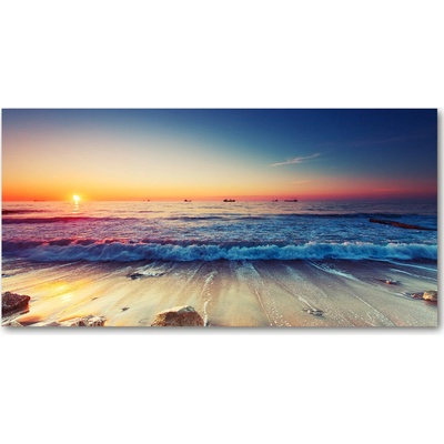 Fotoobraz na skle Východ slunde mora 100x50 cm