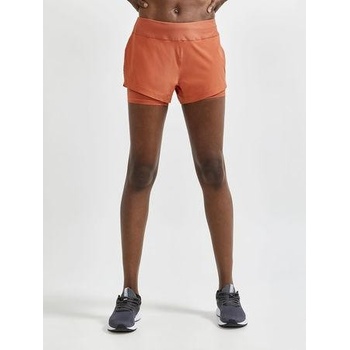 Craft W šortky ADV Essence 2v1 oranžová