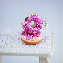 CircusMind Růžovofialové donuty jeden nakousnutý S4636