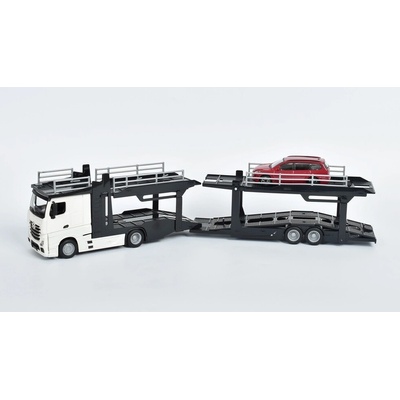 Bburago Mercedes Actros 2545 s modelem Ford Focus bílá zelená 1:43