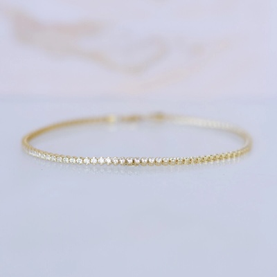 Lillian Vassago Zlatý tenisový náramek zdobený čirými zirkony LLV01-GB019