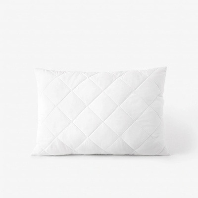Goldea prošívaný polštář Comfort s výplní z polyesterových kuliček z dutého vlákna 70x50