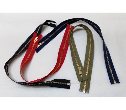 Zip mosazný 35 cm
