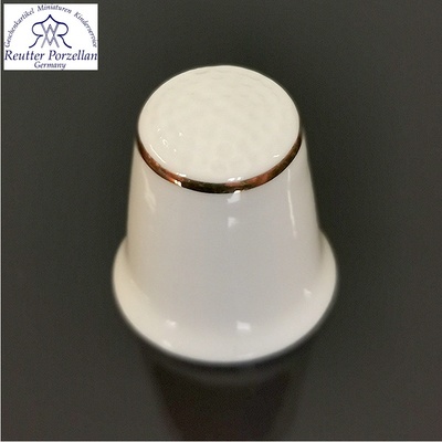 Reutter Porzelan - Porcelánový náprstok biely so zlatým lemovaním