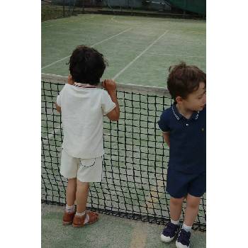 Konges Sløjd Детска памучна тениска с яка Konges Sløjd FLORIAN POLO SHIRT GOTS (KS104814.PPY2)