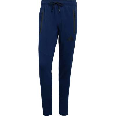 adidas TIRO TRAVEL SW PANT Tmavě modrá Černá