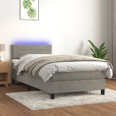 Petrashop 3134435 boxspring postel s matrací a LED světle šedá samet