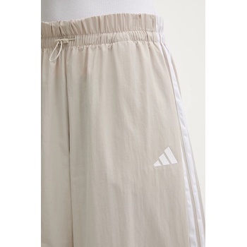 adidas Спортен панталон adidas Essentials в бежово с апликация JC8168 (JC8168)