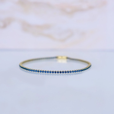 Lillian Vassago Zlatý tenisový náramek zdobený modrými zirkony LLV03-GB003