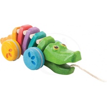 Plan Toys tancujúci krokodíl dúhový