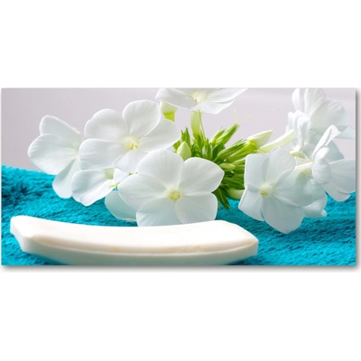 Foto obraz sklo tvrzené Biele kvety spa 100x50 cm