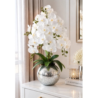 Orchidea v guľatom zrkadlovom kvetináči