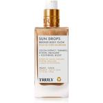 Truly Sun Drops блестящо бронзиращо олио за тяло 90ml