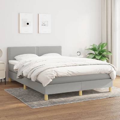 Petrashop 3140529 boxspring postel s matrací světle šedá textil