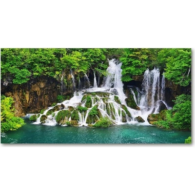 Foto obraz sklenený horizontálny Vodopád v horách 100x50 cm