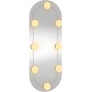 vidaXL Стенно огледало с LED лампи 20x50 см стъкло овално (3189159)
