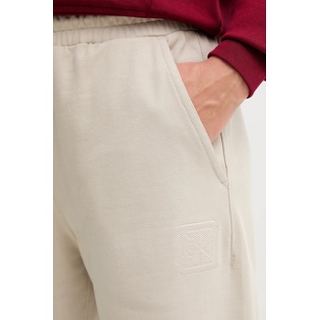 Calvin Klein Спортен панталон Calvin Klein в бежово с апликация LV044D205G (LV044D205G)