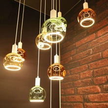 Segula LED žiarovka plávajúca E27 oranžová G200 6W 922 dim 55542
