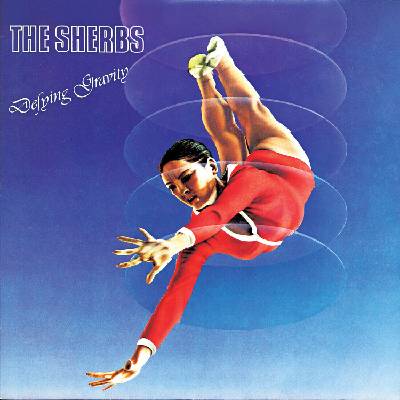 The Sherbs - Defying Gravity (Clear Pink with Blubble Splatter and Deep Purple Splatter Coloured) (LP) (630428017030)