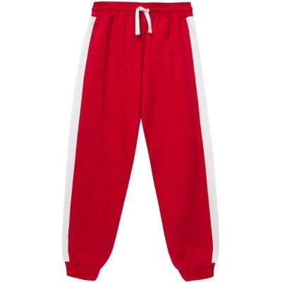 Winkiki Kids Wear dívčí tepláky Sport červená