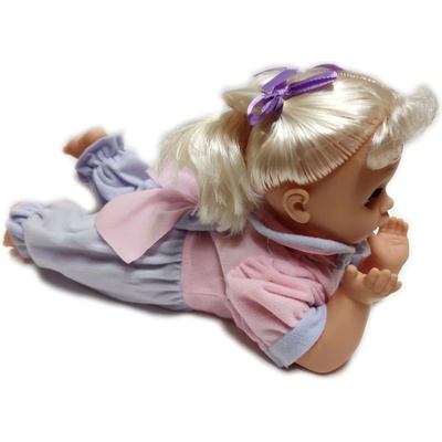 Кукла - музикална, с подвижни крака и глава, легнала