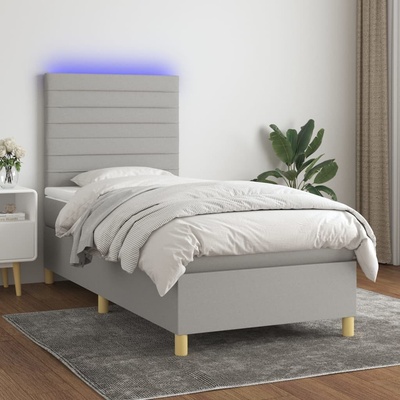 Petrashop 3135485 boxspring postel s matrací a LED světle šedá textil