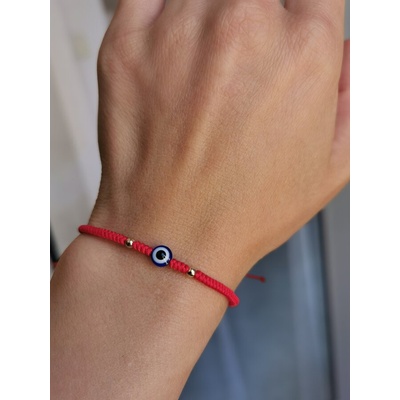 Синьо око с червен конец и злато