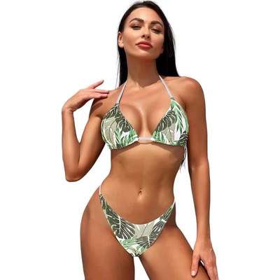 Дамски бански в бяло със зелени листа