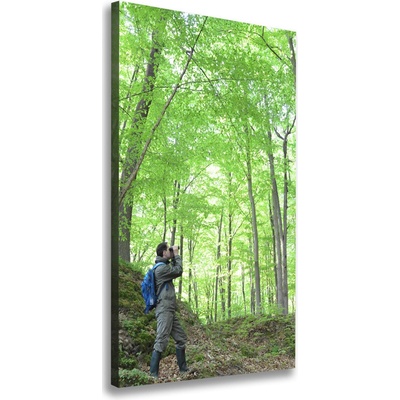 Vertikálny foto obraz na plátne do obývačky Ornitológ 50x100 cm