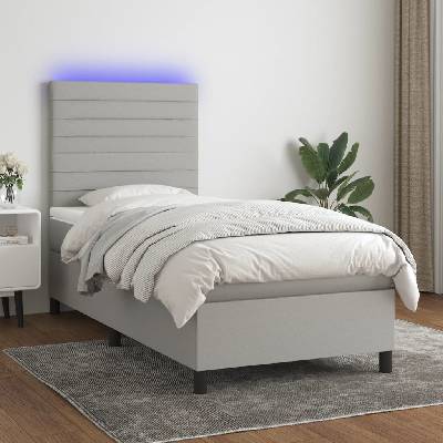 Petrashop 3134917 boxspring postel s matrací a LED světle šedá textil