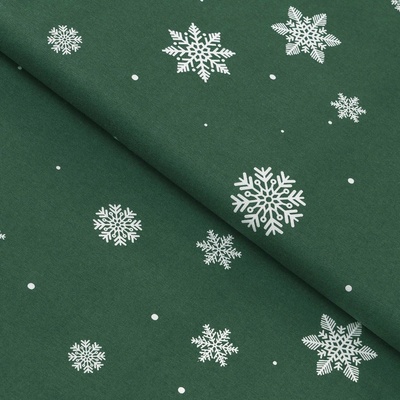 Goldea flanelová látka - snehové vločky na zelenej 240 cm