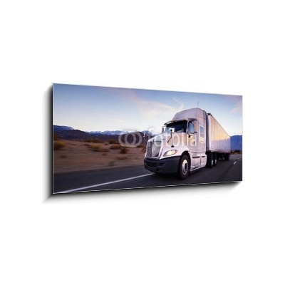Skleněný obraz 1D panorama - 120 x 50 cm - Truck and highway at sunset - transportation background Kamion a dálnice při západu slunce