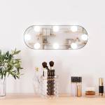 vidaXL Стенно огледало с LED лампи 15x40 см стъкло овално (3189158)